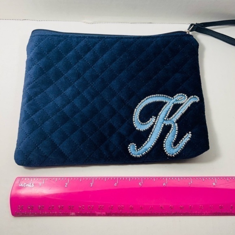 Cute personalized blue quilted wristlet with “K” on the front
